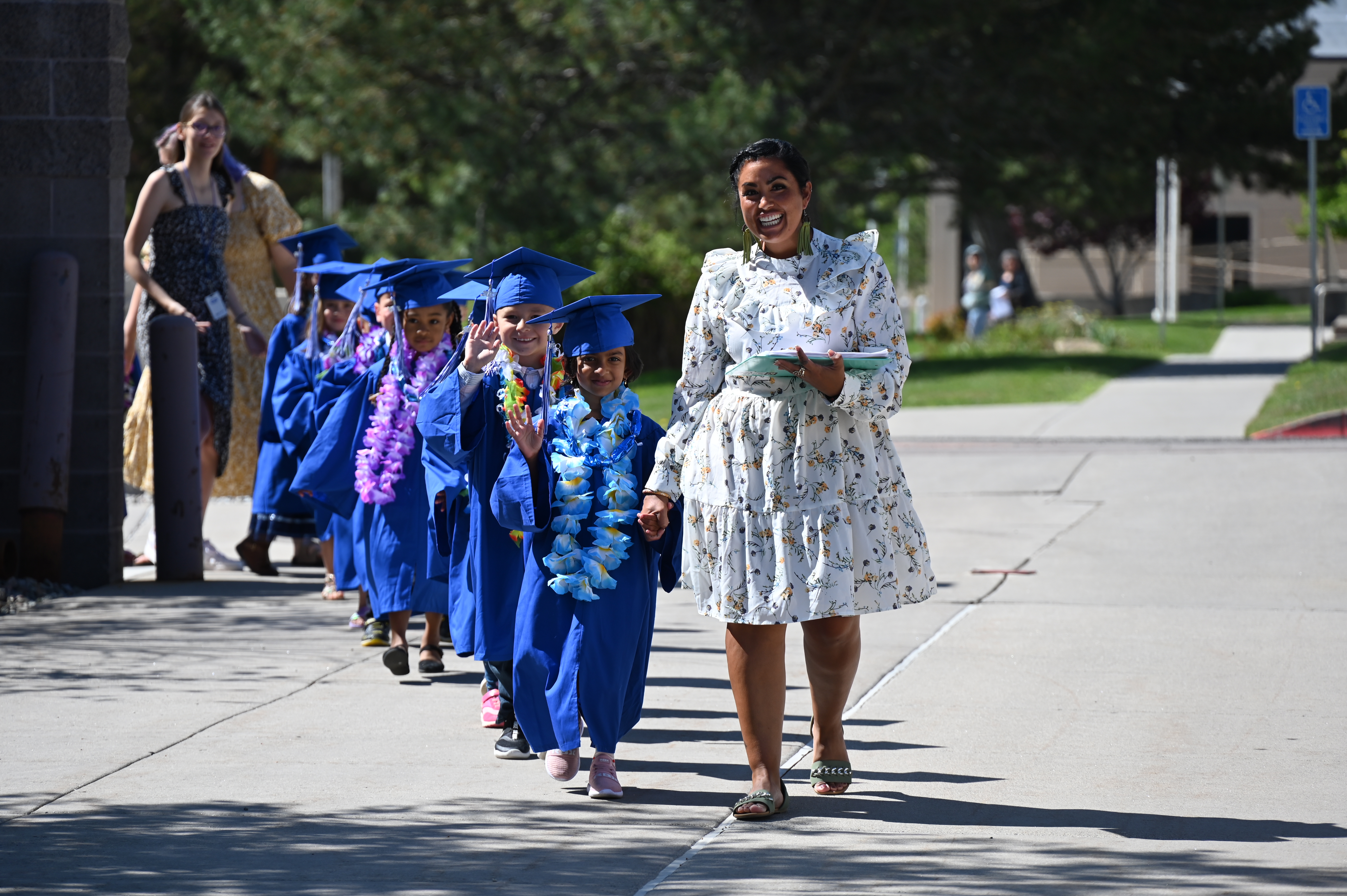 Graduates with Teacher Ms. Frankie