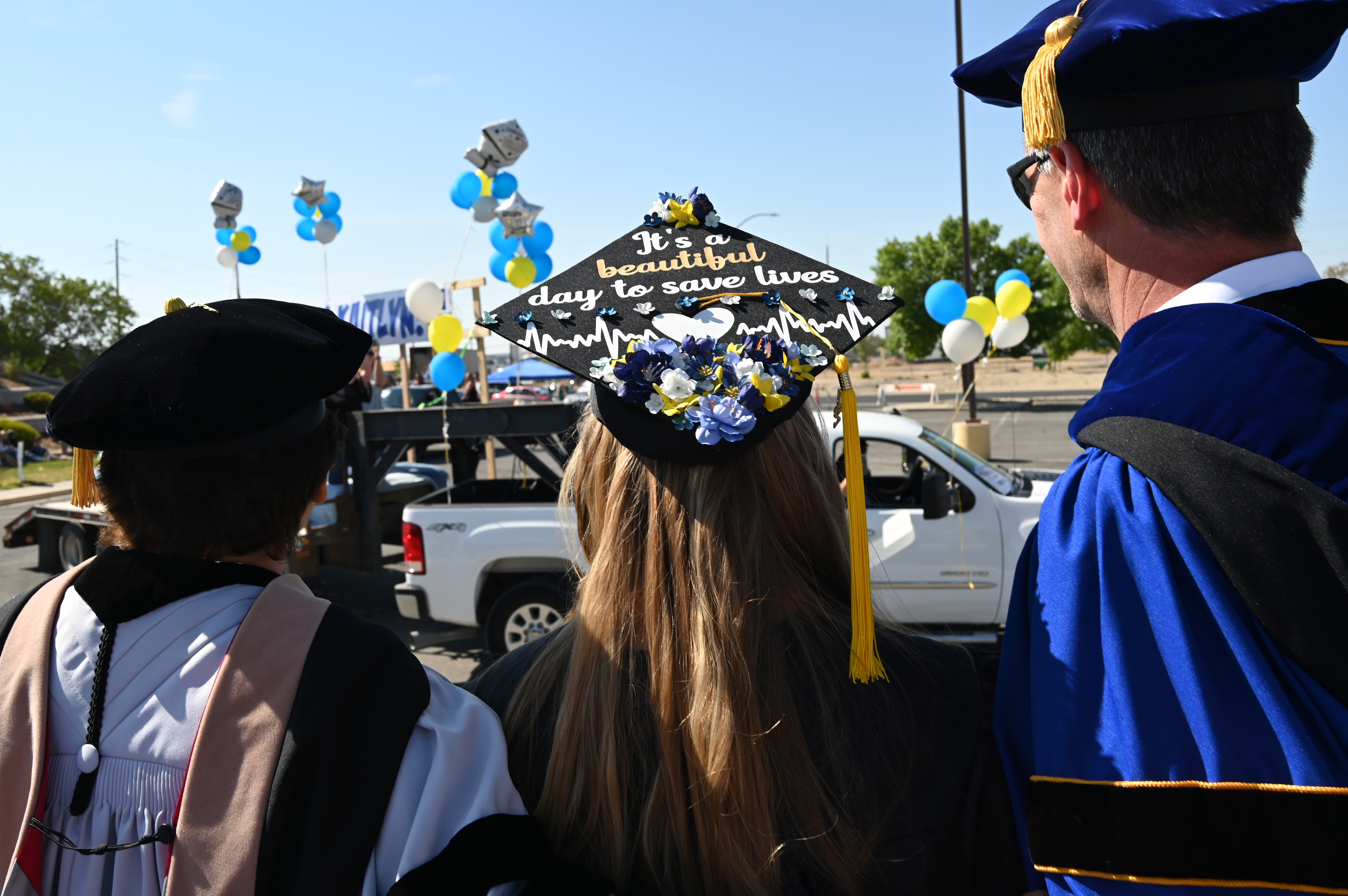 student cap that says its a nice day to save lives