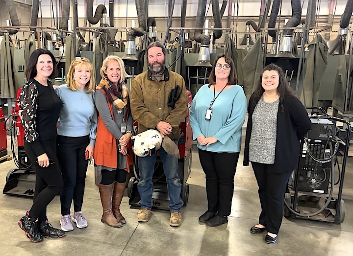 DETR representatives with Welding Instructor Randy Naylor during their tour of Western Nevada College's WCTE facilities on Oct. 11.
